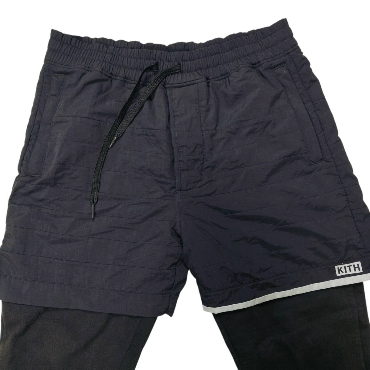 KITH NYC レイヤードパンツ Mサイズ スウェット×ナイロン ロゴ 黒 ブラック キス 裾ファスナー ウエストゴム ドローコード 裏起毛_画像3