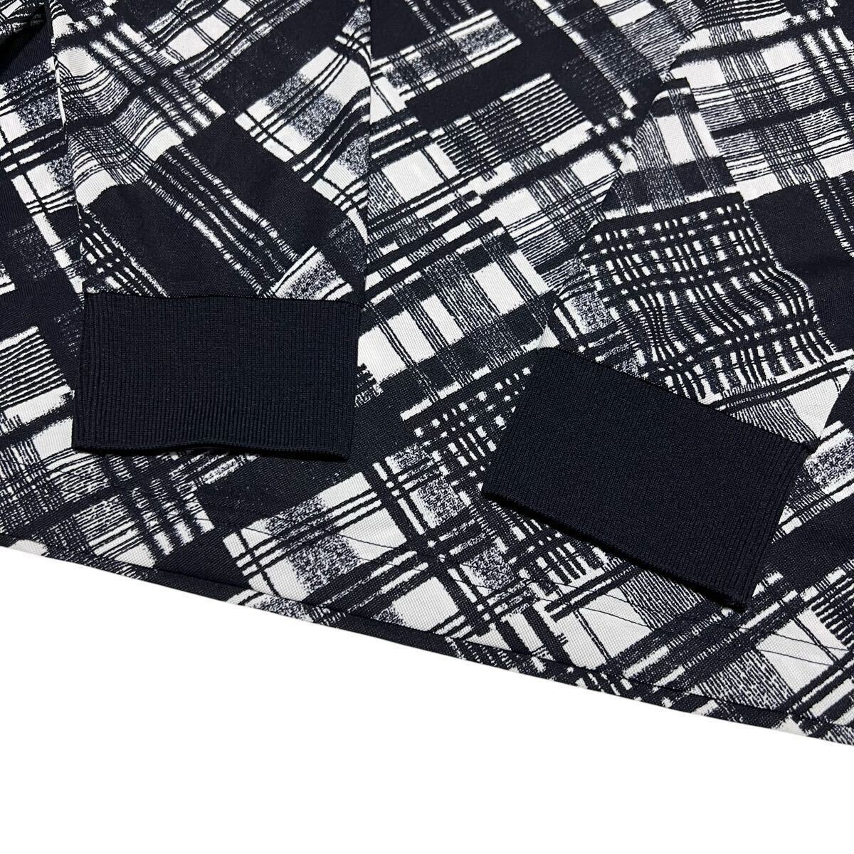 未使用品級 マンシングウェア 長袖ポロシャツ M ブラック×ホワイト 総柄 ポリエステル ゴルフウェア Munsingwear 1円〜_画像5