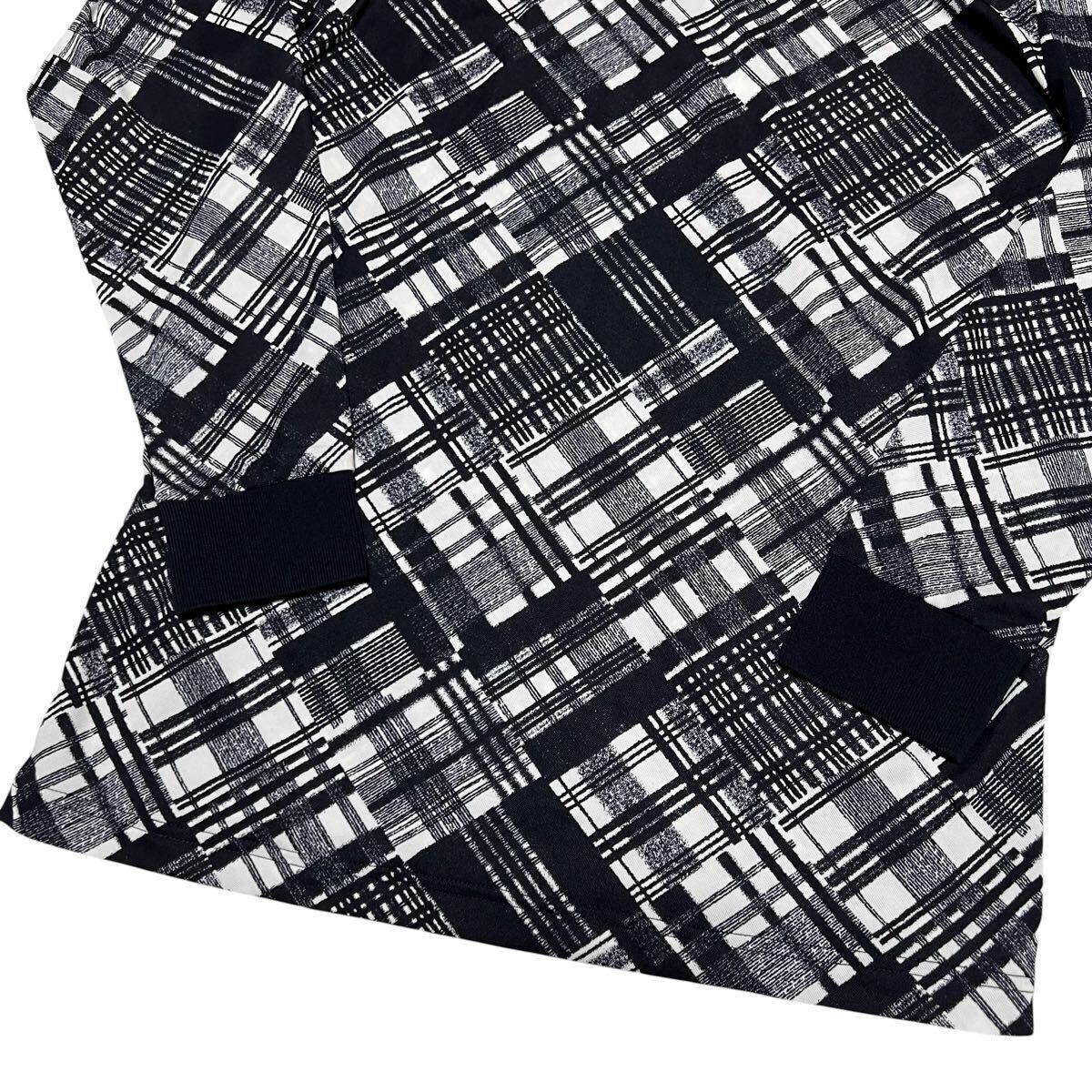 未使用品級 マンシングウェア 長袖ポロシャツ M ブラック×ホワイト 総柄 ポリエステル ゴルフウェア Munsingwear 1円〜_画像8