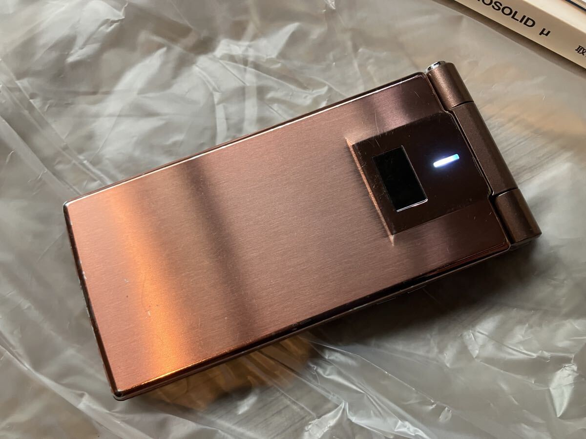 送料込 電源液晶画面確認済 初期化済 ガラケー 折りたたみ パナソニック FOMA Ｐ705i ドコモ ブラウン 外箱 取説 CD モック_画像3