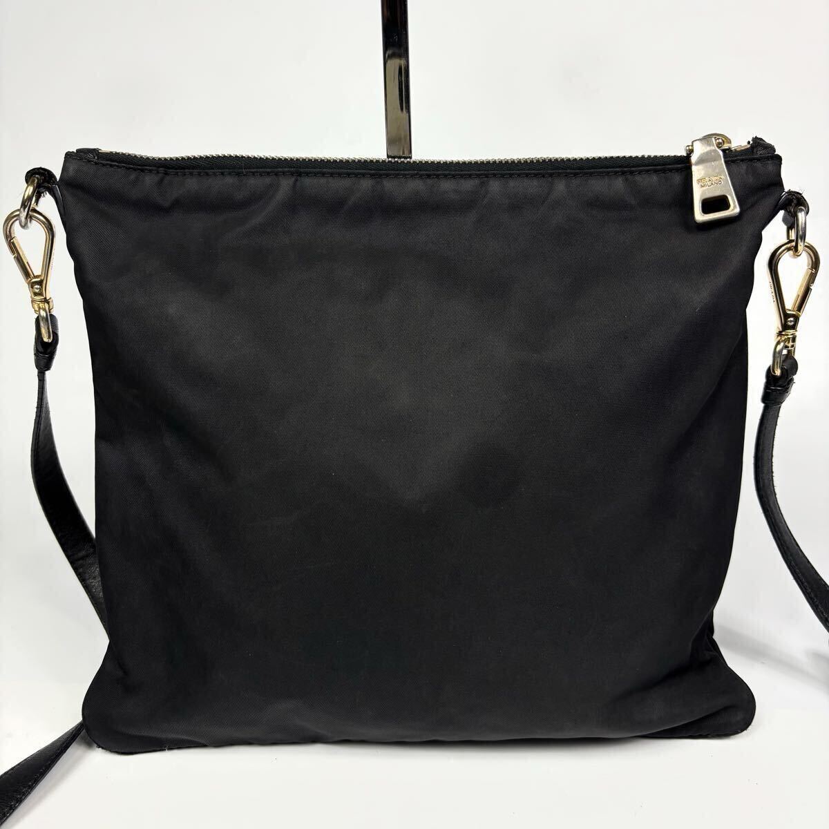 PRADA プラダ ショルダーバッグ サコッシュ レディース 黒 ナイロン ブラック 斜め掛け ロゴ金具 リボン 保存袋あり_画像3
