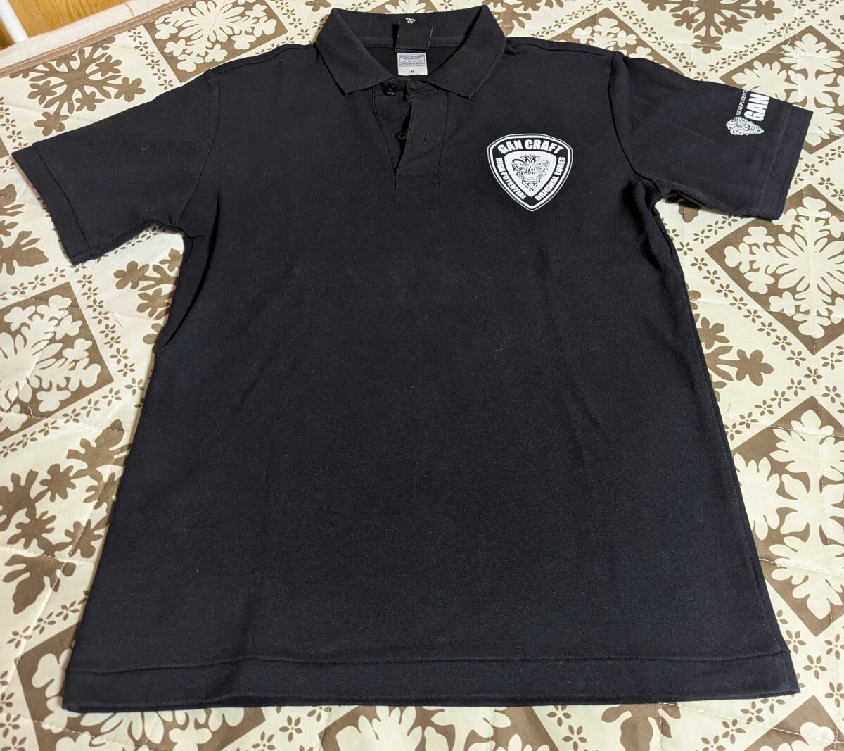 開封済み未使用品 希少 ガンクラフト ポロシャツ Мサイズ フェイスロゴ ブラック_画像1