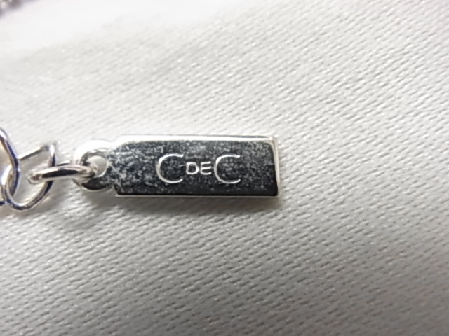 CDEC COUP DE CHANCE クードシャンス 薄いピンクラインストーンが輝く　3連フープのトップ　保存袋付き　シルバーカラー　銀色　ネックレス_画像4