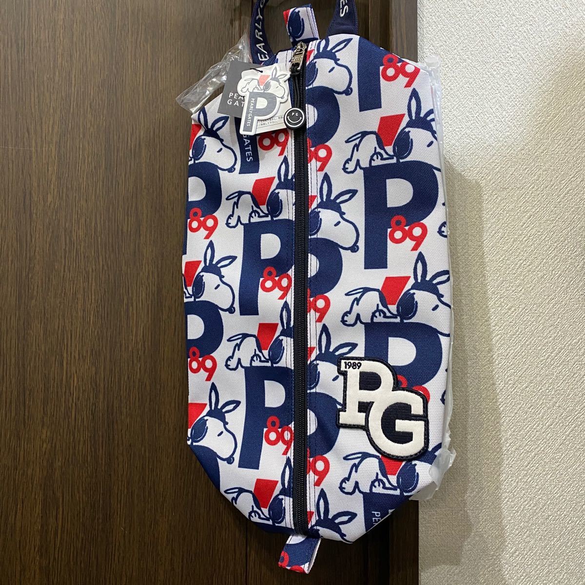 パーリーゲイツSNOOPY総柄シューズケース新品未使用ホワイト パーリーゲイツSNOOPY総柄シューズケース新品未使用ホワイト