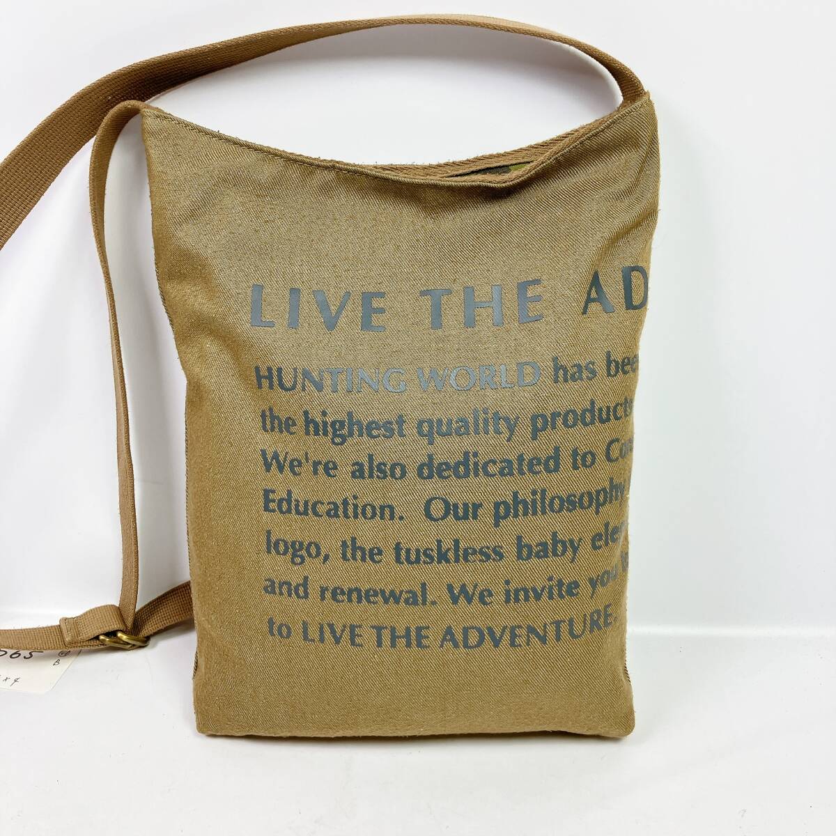 2565◯ HUNTING WORLD ハンティングワールド ショルダーバッグ キャンバス ブラウンカーキ 英字プリント ユニセックス 迷彩柄 カモフラ_画像2