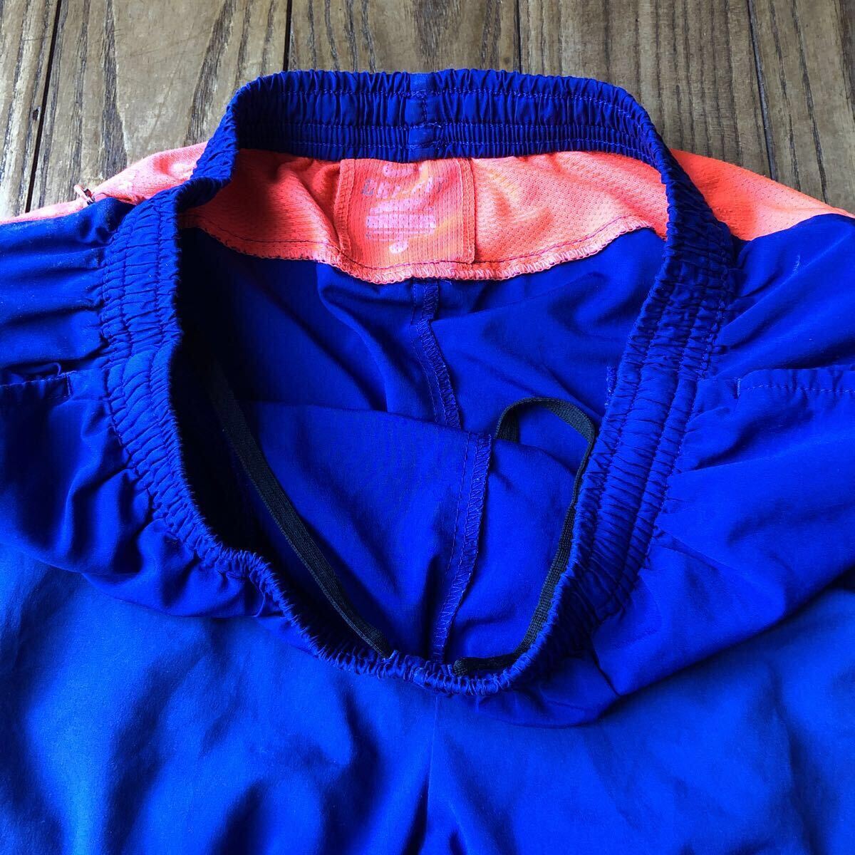 ナイキ（NIKE） ショートパンツ　 ランニングパンツ　 DRI-FIT 　サイズM　ブルー×蛍光オレンジ_画像5