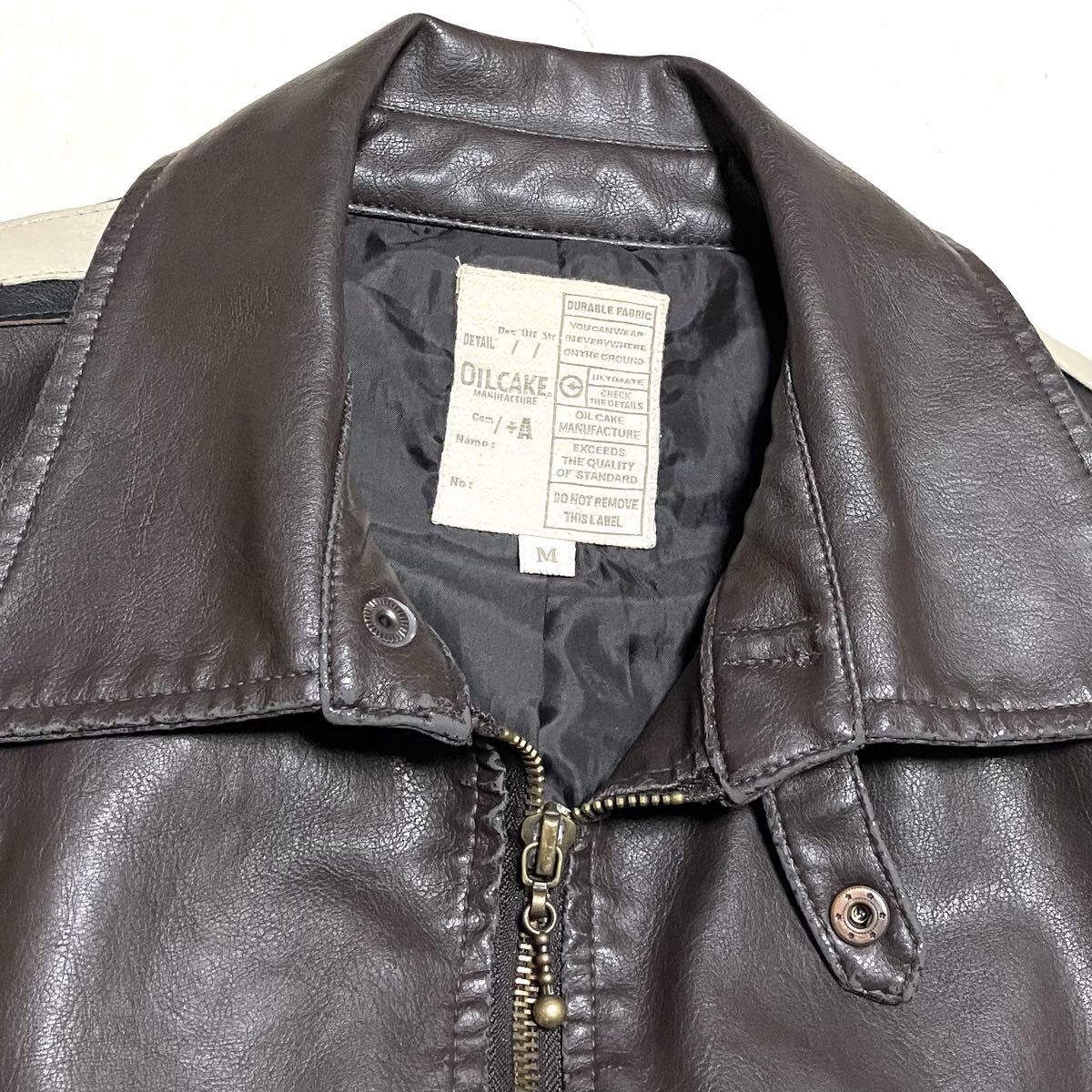 送料無料 OIL CAKE フェイクレザー サイドライン シングルライダースジャケット クリーニング済み_画像6