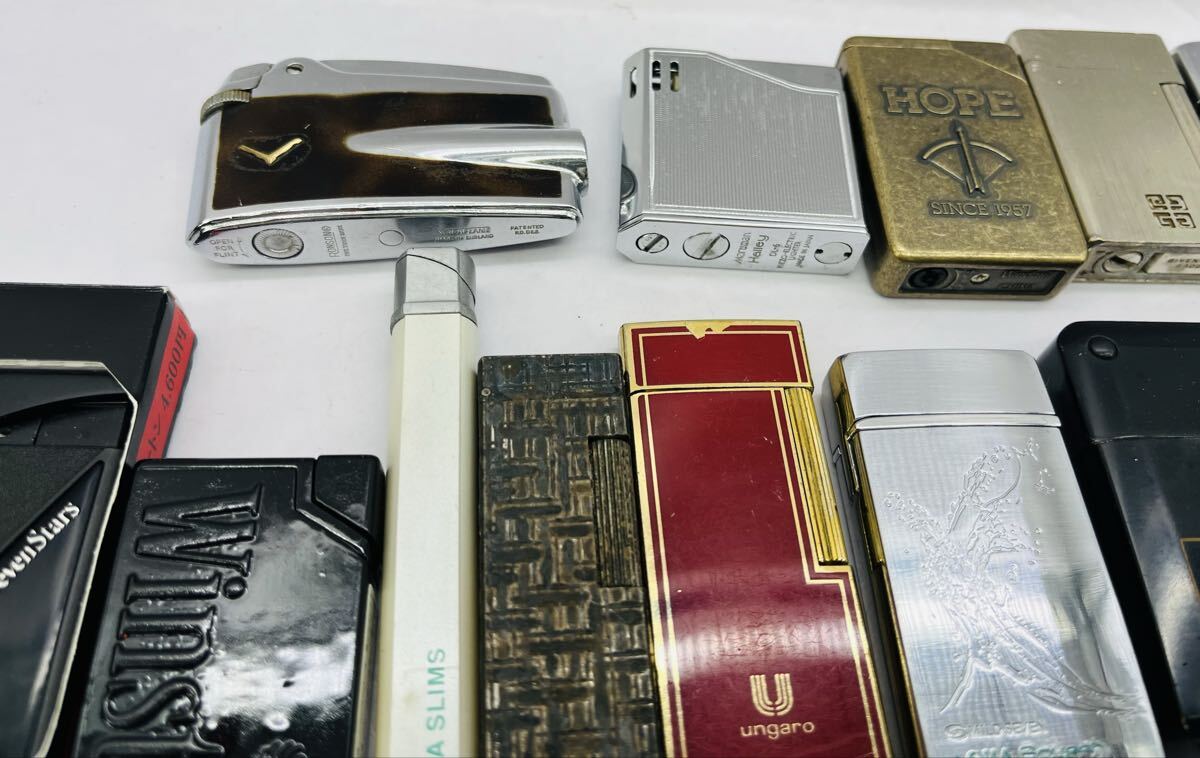 ◎1円◎ ブランド含む ライター45個まとめ売り zippo YSL ジバンシーマルマン タバコ銘柄他 色々まとめて 着火未確認 ジャンク★同梱不可_画像6