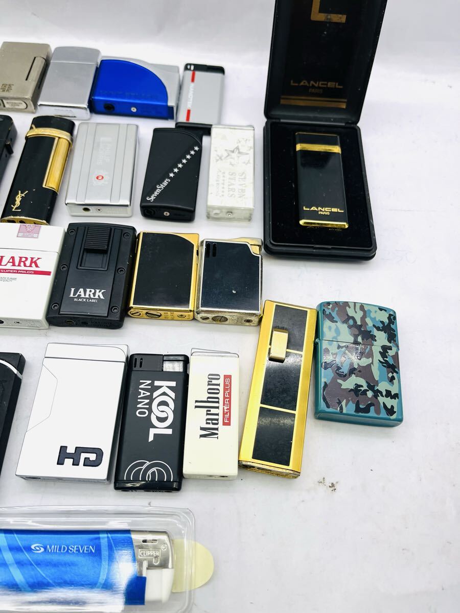 ◎1円◎ ブランド含む ライター45個まとめ売り zippo YSL ジバンシーマルマン タバコ銘柄他 色々まとめて 着火未確認 ジャンク★同梱不可_画像4