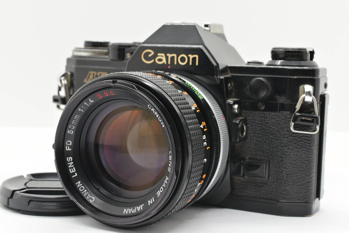 Canon Canon AE-1 Black 35mm Film Camera пленочный фотоаппарат FD 50mm f/1.4 S.S.C Prime Lens ручной диапазон фокусировки линзы TN71919T