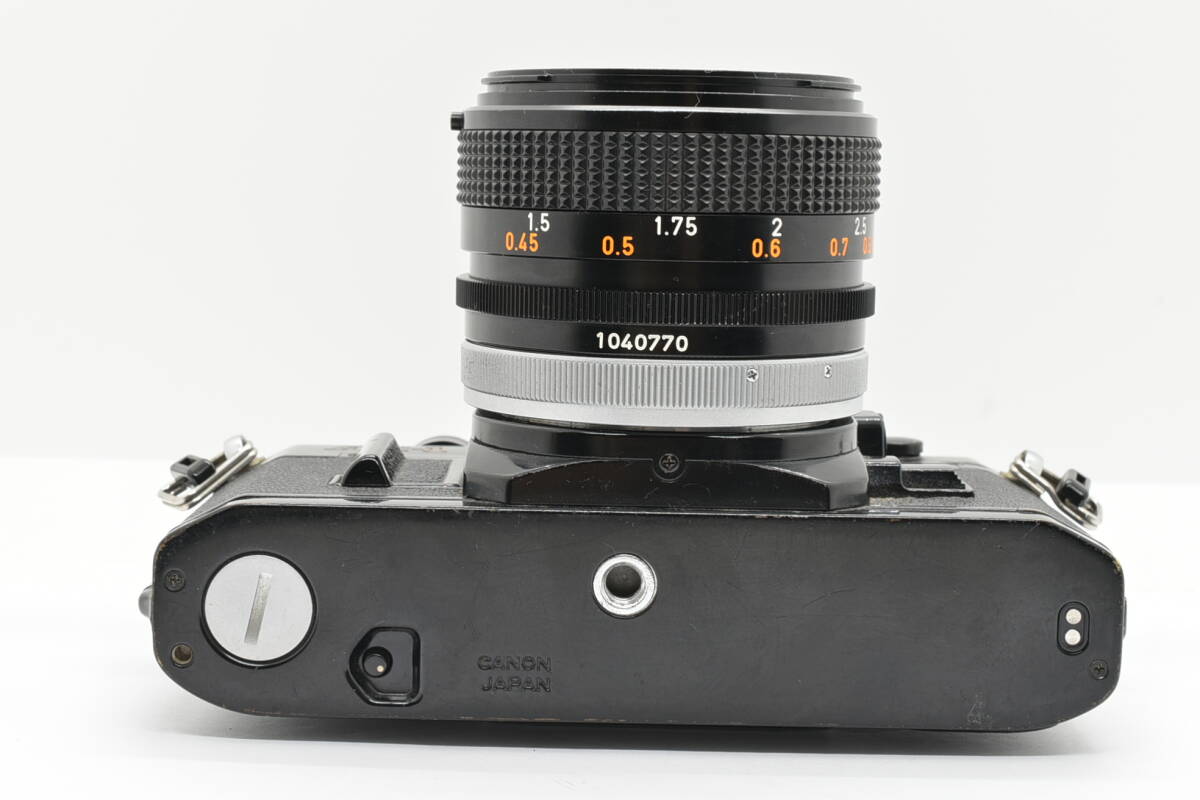 Canon Canon AE-1 Black 35mm Film Camera пленочный фотоаппарат FD 50mm f/1.4 S.S.C Prime Lens ручной диапазон фокусировки линзы TN71919T