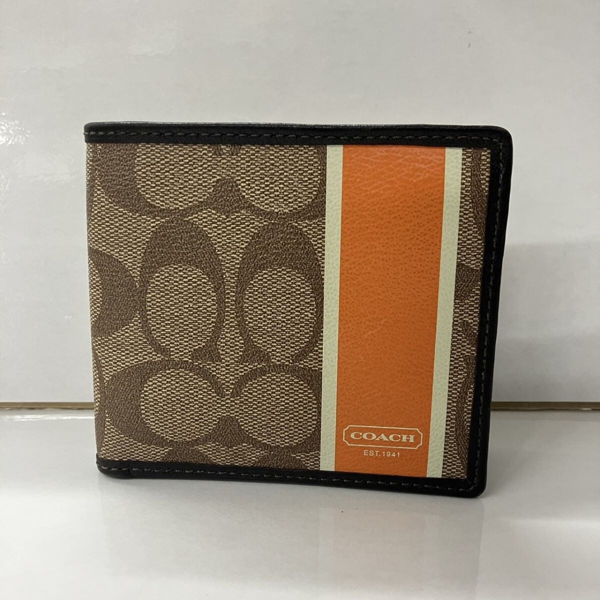 Z016-F7-878◎ COACH コーチ 二つ折り財布 シグネチャー ストライプ レザー ヘリテージ FF_画像1