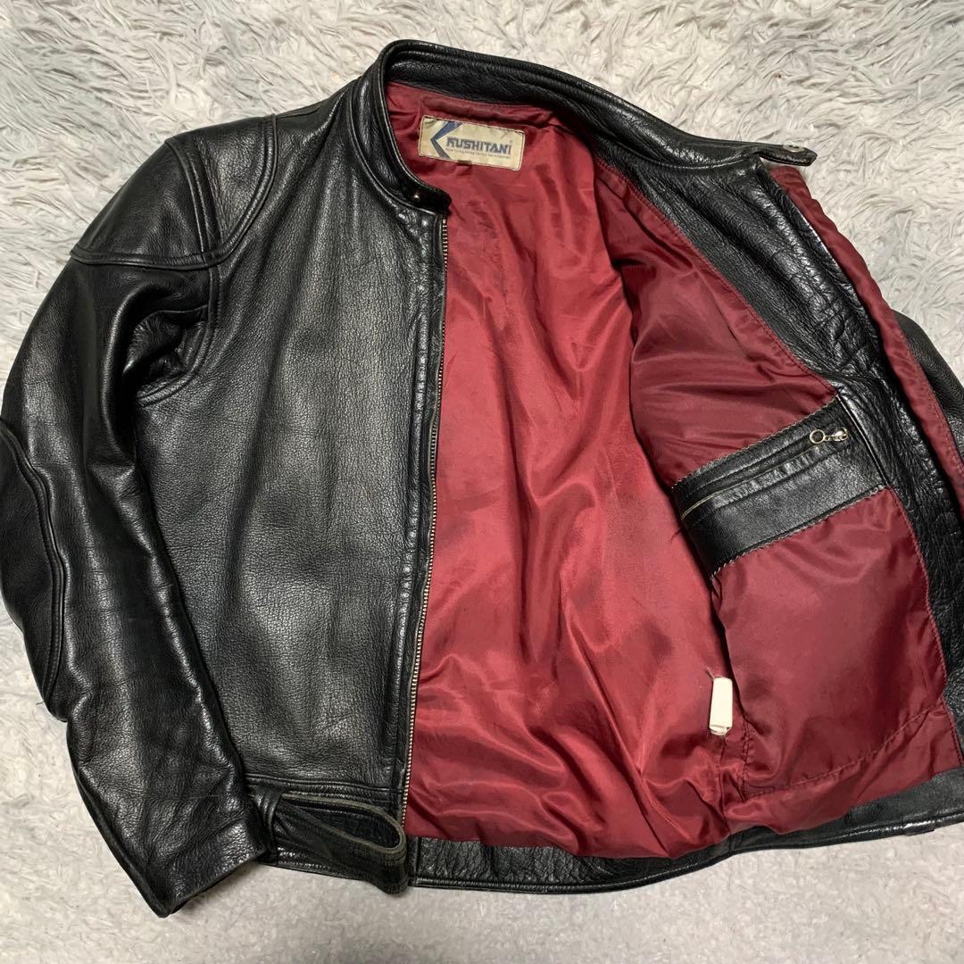 希少 L KUSHITANI クシタニ レザージャケット シングルライダース バイクウェア ワッペン 牛革 本革 カウレザー 黒 ブラック メンズ_画像1