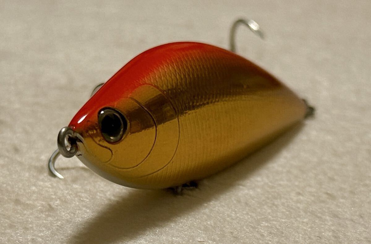 中古美品　タックルハウス シンキングシャッド70 ゴールドオレンジ_画像1