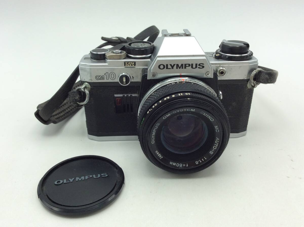 RR74★【動作/精度未確認】フィルムカメラ OLYMPUS オリンパス OM10 一眼レフ レンズ 1:1.8 f=50ｍｍ 現状品 ジャンク品_画像1