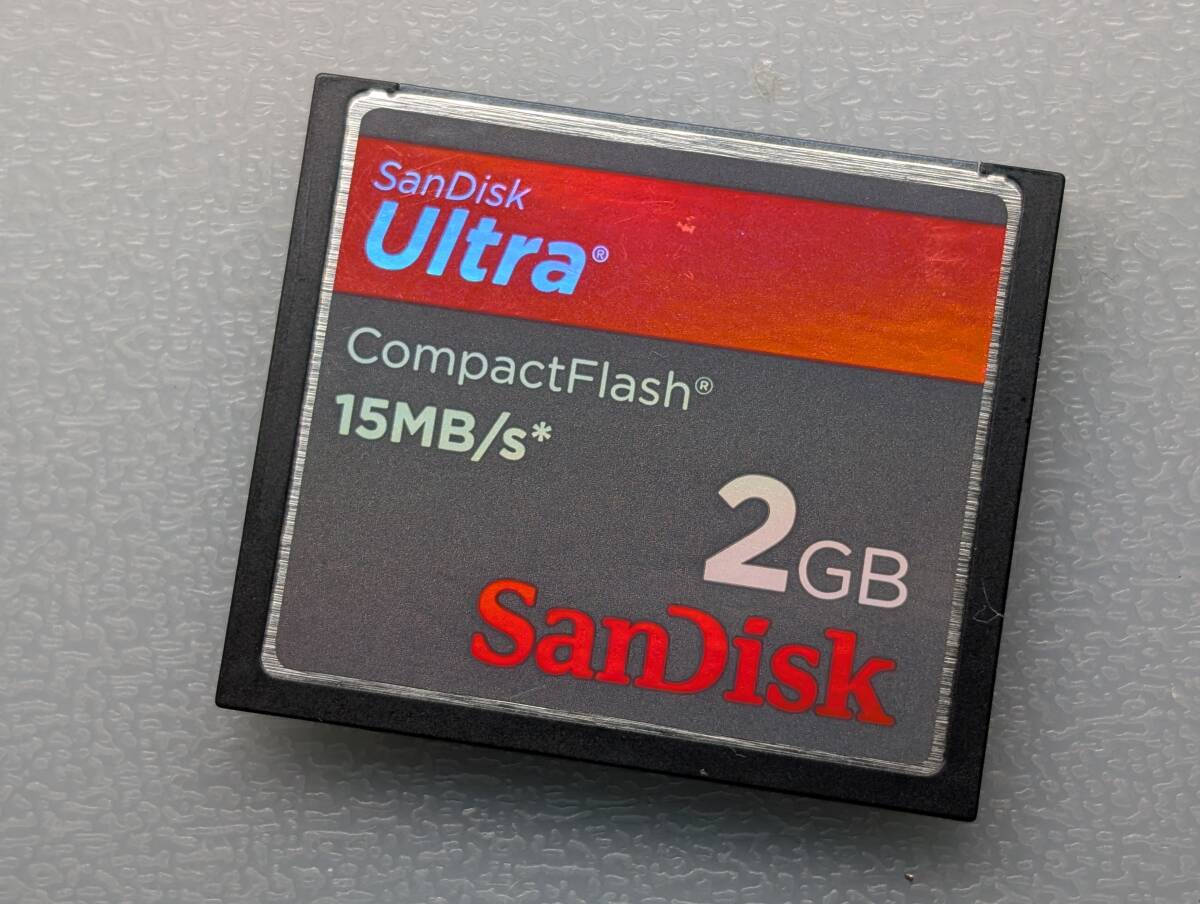 SanDisk CompactFlash Ultra 2GB CF футляр для карточек имеется SanDisk CompactFlash карта памяти рабочее состояние подтверждено 