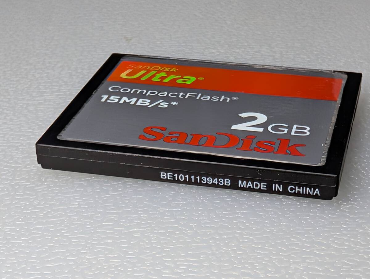 SanDisk CompactFlash Ultra 2GB CF футляр для карточек имеется SanDisk CompactFlash карта памяти рабочее состояние подтверждено 