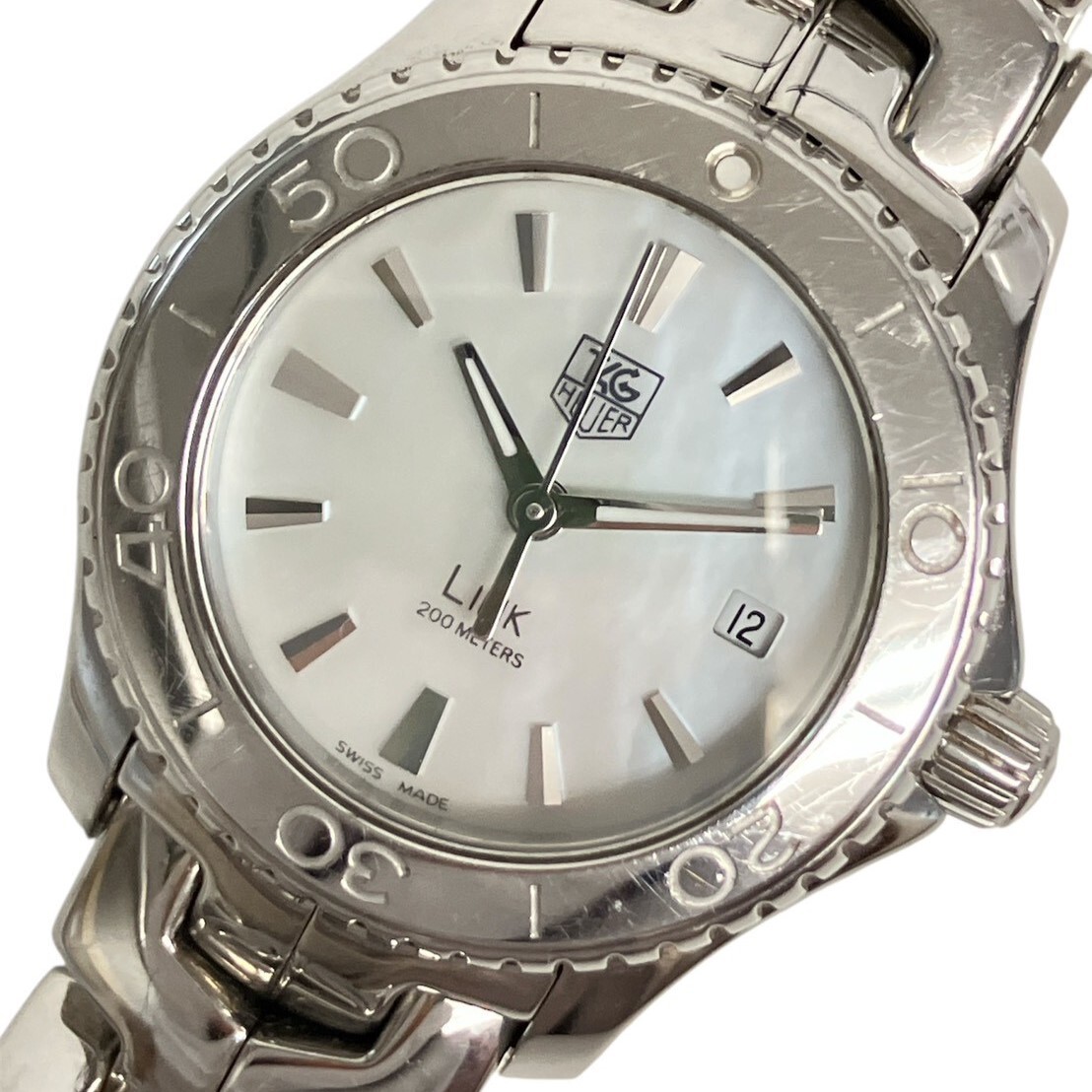 Z069-W19-1175◎ 【電池交換済み/稼働】 TAG HEUER レディース腕時計 LINK WJ1313-0 QUARTZ ラウンド 回転ベゼル シェル文字盤 デイト KA_画像1