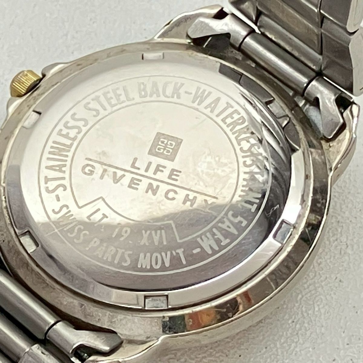 Y064-H35-329◎ GIVENCHY ジバンシイ メンズ腕時計 LIFE ライフ LT.19.XVI QUARTZ 回転ベゼル デイト ラウンド ゴールド文字盤 KA_画像10