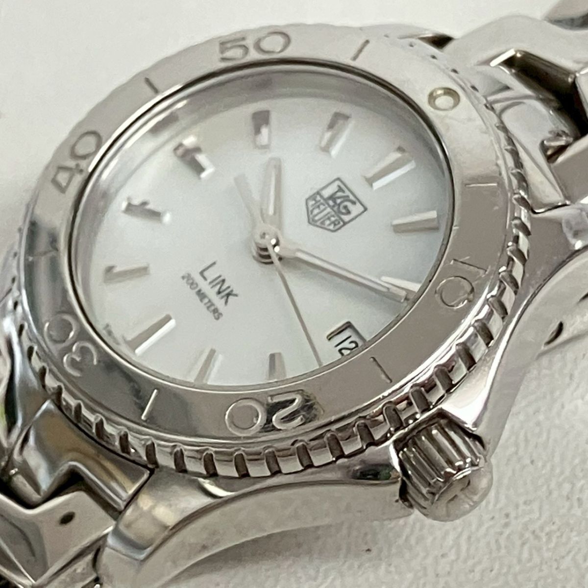 Z069-W19-1175◎ 【電池交換済み/稼働】 TAG HEUER レディース腕時計 LINK WJ1313-0 QUARTZ ラウンド 回転ベゼル シェル文字盤 デイト KA_画像9
