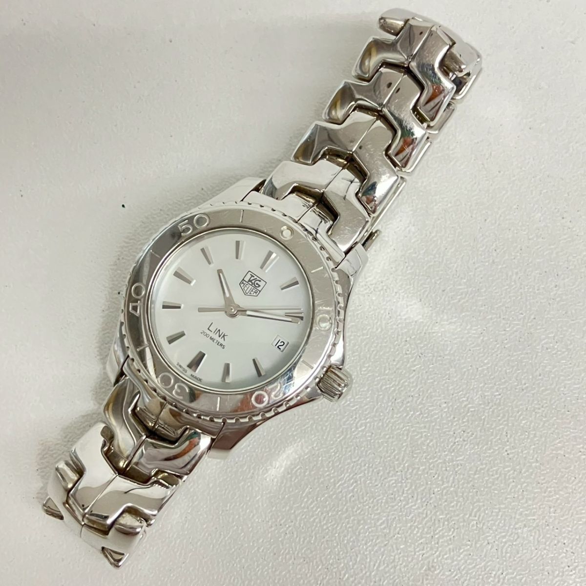 Z069-W19-1175◎ 【電池交換済み/稼働】 TAG HEUER レディース腕時計 LINK WJ1313-0 QUARTZ ラウンド 回転ベゼル シェル文字盤 デイト KA_画像10