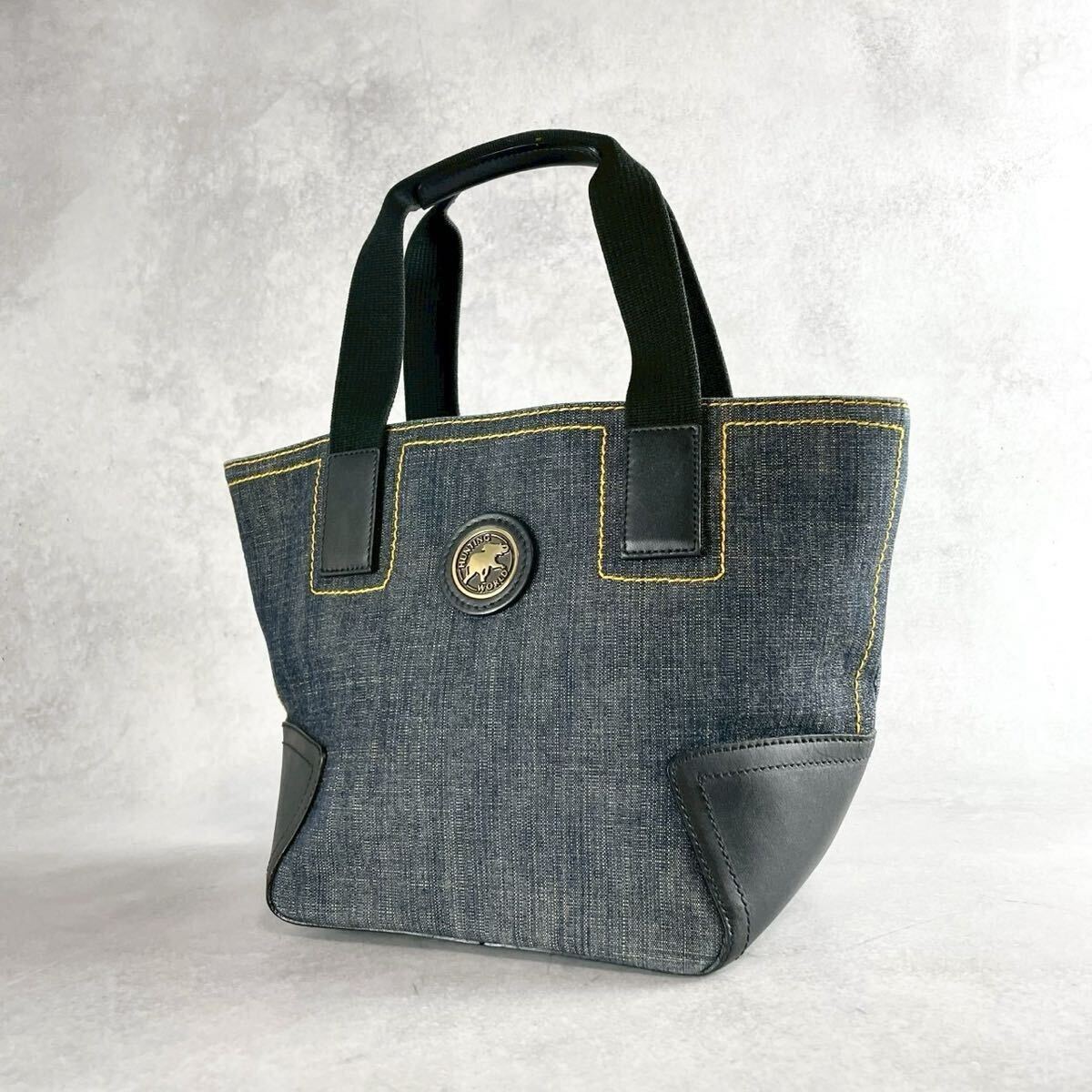 не использовался класс HUNTING WORLD Hunting World большая сумка ручная сумочка Denim Logo plate независимый кожа синий цвет серия голубой прекрасный товар Safari не использовался класс HUNTING WORLD Hunting World большая сумка ручная сумочка Denim Logo plate независимый кожа синий цвет серия голубой прекрасный товар Safari