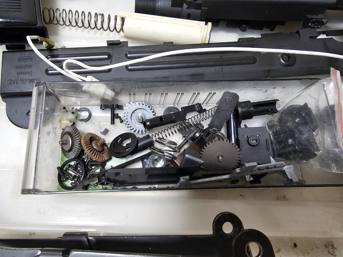  детали Tokyo Marui UZI стандартный электрооружие stock ресивер рукоятка верх покрытие поршень barrel камера и т.п. б/у товар Junk u-ji-