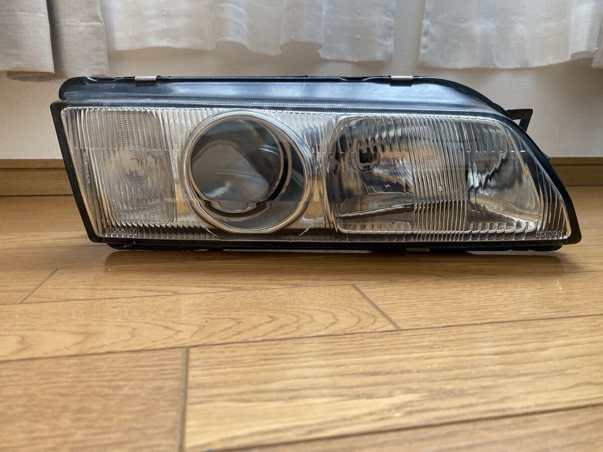 日産 スカイライン 純正 ヘッドライト 左側 HXN23PR _画像1