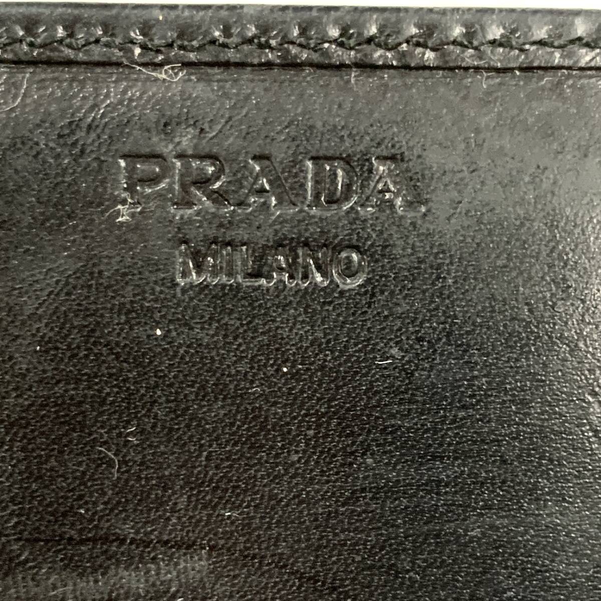 1 иен ~ 6TA35121025 PRADA Prada 1M0201 длинный кошелек складывающийся пополам кожа черный б/у товар бренд товар