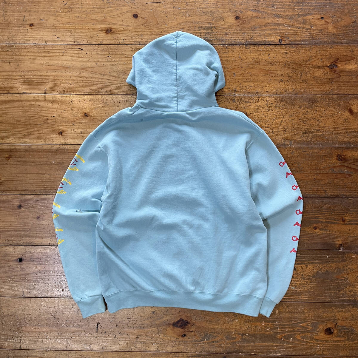 USA 古着 Champion チャンピオン スウェット パーカー ロゴ 袖プリント ライトブルー メンズL BE0158_画像2
