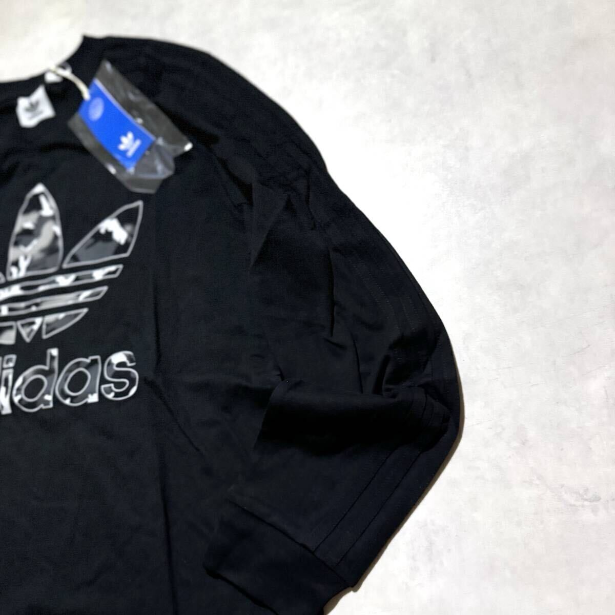 1 иен ~ новый товар стандартный товар XL размер Adidas Originals футболка long T длинный рукав камуфляж утка черный чёрный фиолетовый популярный CAMO adidas Originals общий рисунок