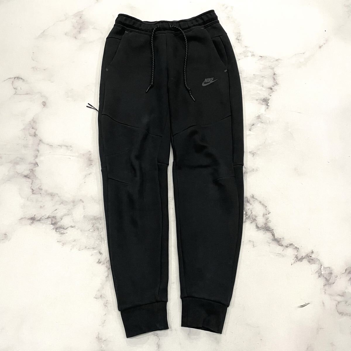 L ○ 人気モデル '都会のカジュアルウェア' NIKE ナイキ ストレッチ イージーパンツ ジョガーパンツ size:M メンズ ボトムス ブラック_画像1