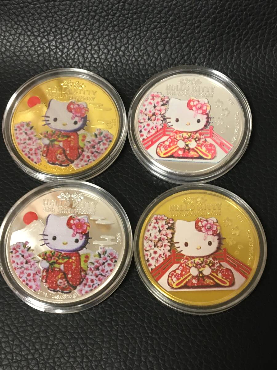 Y50-71)海外丸形記念金貨、銀貨、カラーコイン、メダル*ハローキティ　富士山日の出、桜　40周年記念*参考品4枚まとめ_画像1