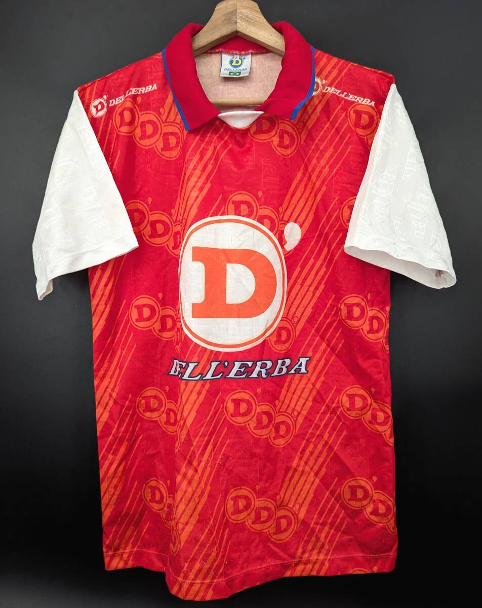 5230C 送料185円♪ ヴィンテージ 90's 90年代 DELLERBA デレルバ ブラジル製 昇華プリント ビッグロゴ サッカーシャツ P(S)_画像1