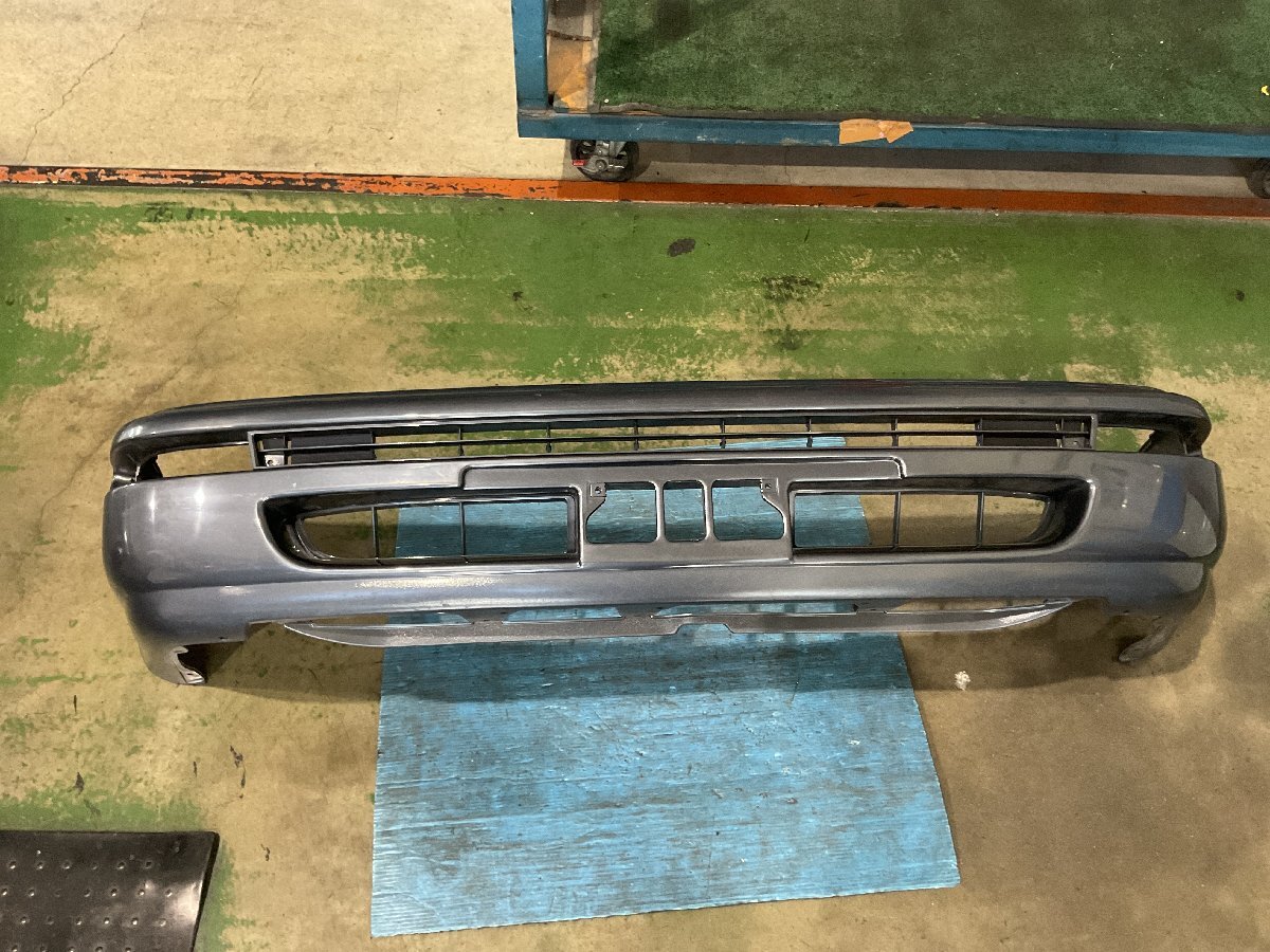 トヨタ カローラ AE101 フロントバンパー 52119-1A880 コーナーセンサー無 カラー№不明 青　(B3-701 ID:109 ）_画像1