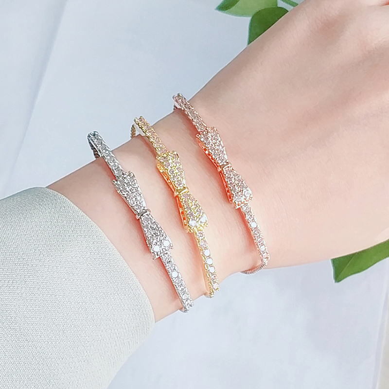 繊細な輝きで気品をプラス●リボン型czダイヤモンド●ローズゴールド色ブレスレット_画像1