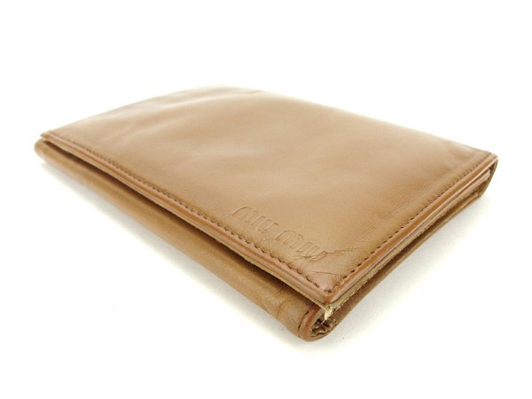 【ブラックフライデー30%OFFクーポン】ミュウミュウ 三つ折り財布 レディース ロゴ ブラウン 中古_画像3