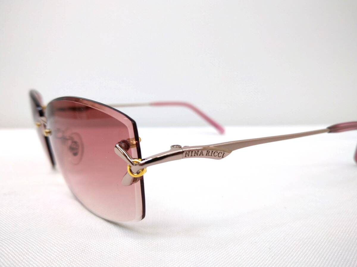 T-291 новый товар не использовался хранение товар солнцезащитные очки очки бренд NINA RICCI Nina Ricci 58*16 135 21g безграничный нет розовый серия wine red серия NR26017
