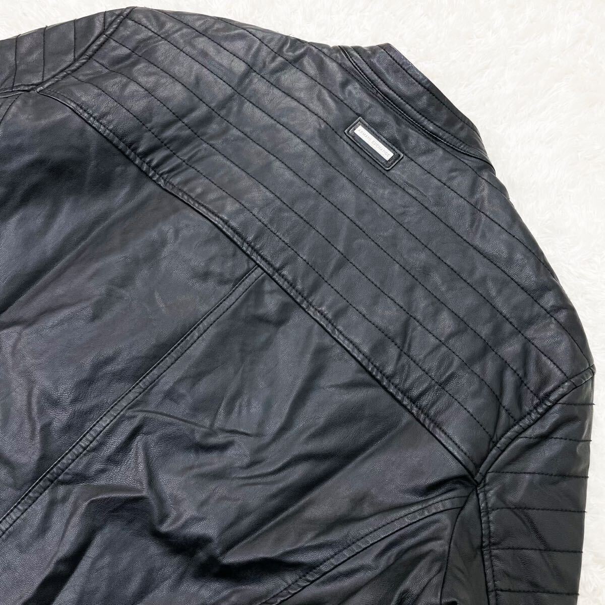超希少!!lXL相当!!アルマーニエクスチェンジ【ド派手な一着】レザー ライダース ジャケット キルティング 裏地ロゴ柄 黒 ブルゾン ARMANI _画像7