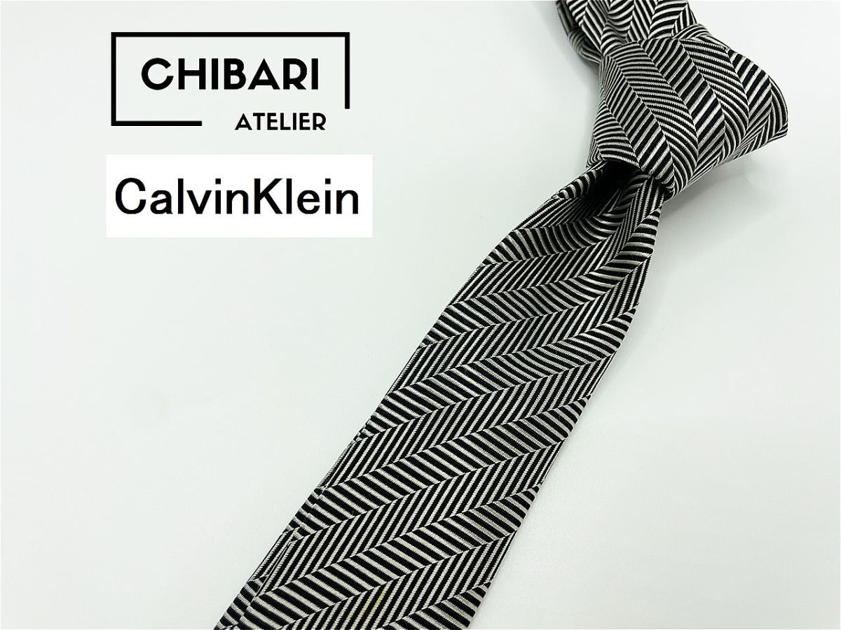 【超美品】CalvinKlein　カルバンクライン　レジメンタル柄 ネクタイ 3本以上 送料無料 メンズ ブラック系　ナロータイ　1004254_画像1
