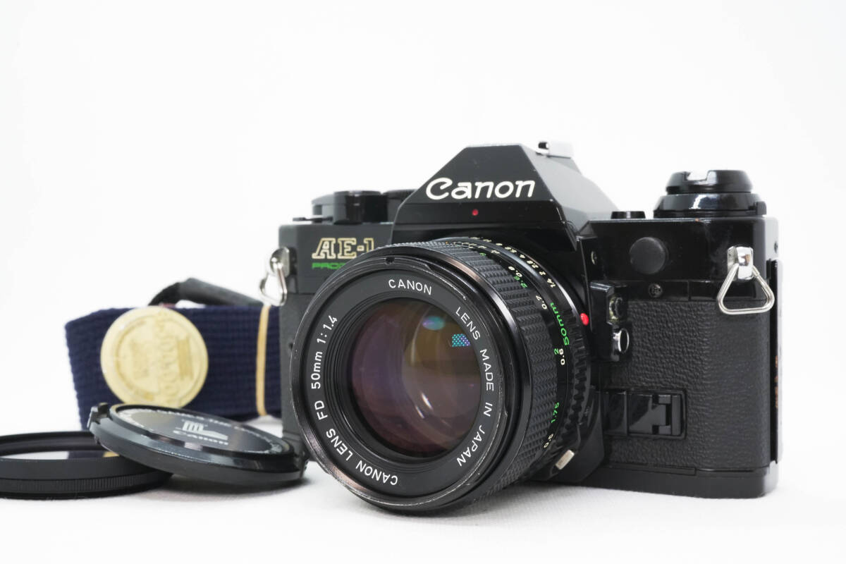[美品] Canon AE-1 PROGRAM+Canon NEW FD 50mm f1.4 単焦点レンズセット キャノン MFレンズ 一眼フィルム_画像1