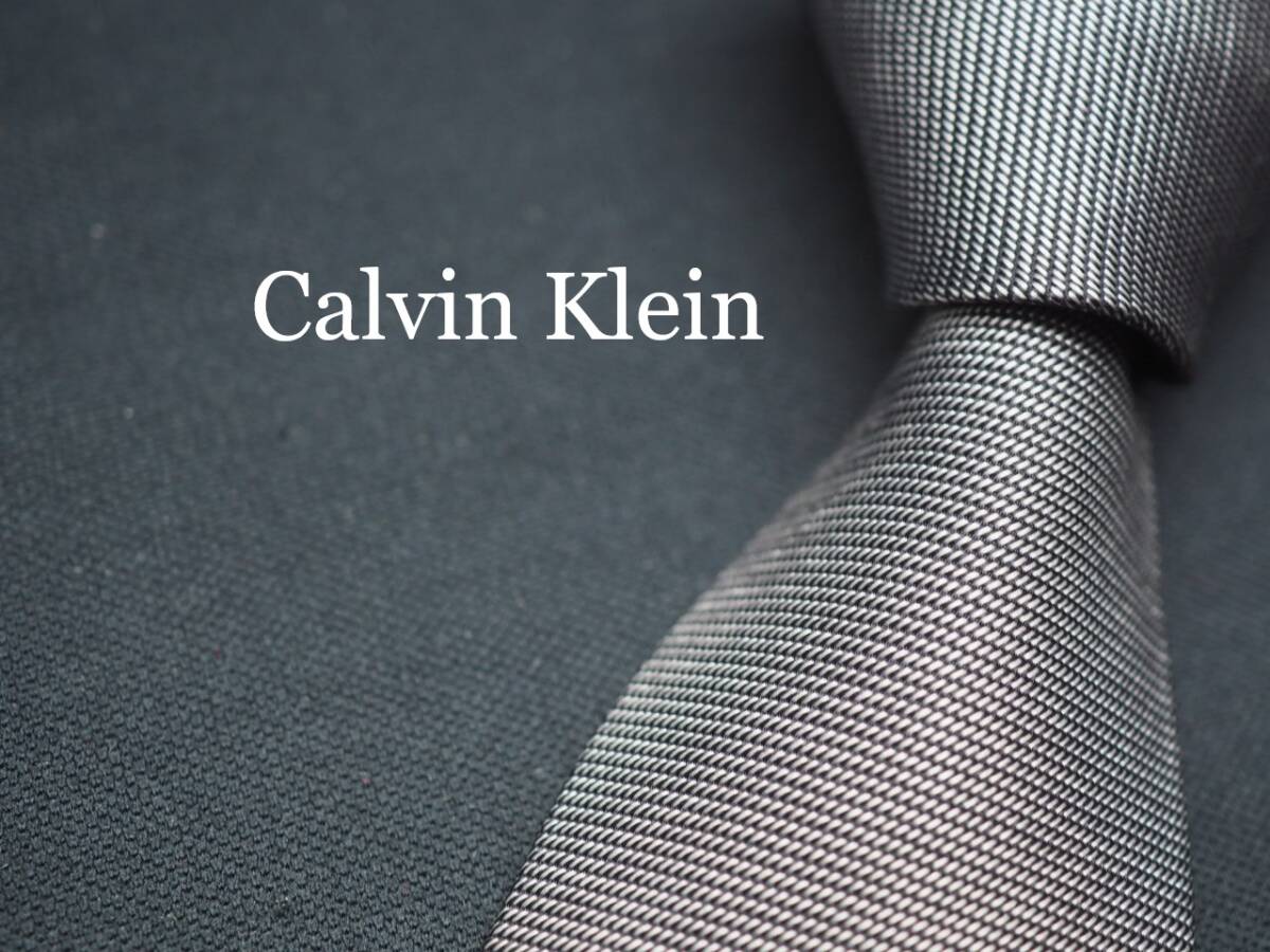 【Calvin Klein カルバンクライン】 G2314 細身 シルバー系 SILK ブランド ネクタイ 古着 良品 転売 仕入_画像1