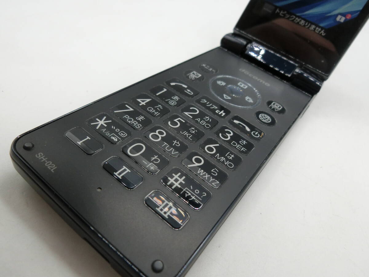 N43145*docomo AQUOS мобильный телефон SH-02L черный суждение 0 бумага коробка * настольный держатель SH50 имеется DoCoMo SHARP