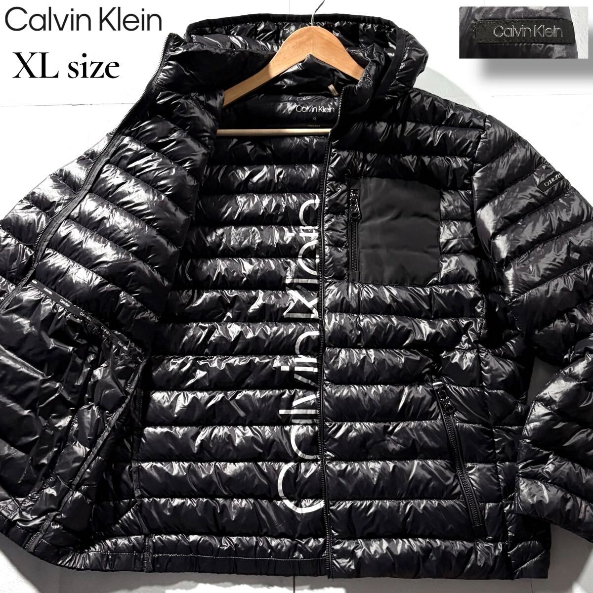 未使用級/XLサイズ●Calvin Klein カルバンクライン プレミアム ダウンジャケット アウター 光沢感 軽量 パッカブル ロゴワッペン 裏地ロゴ_画像1