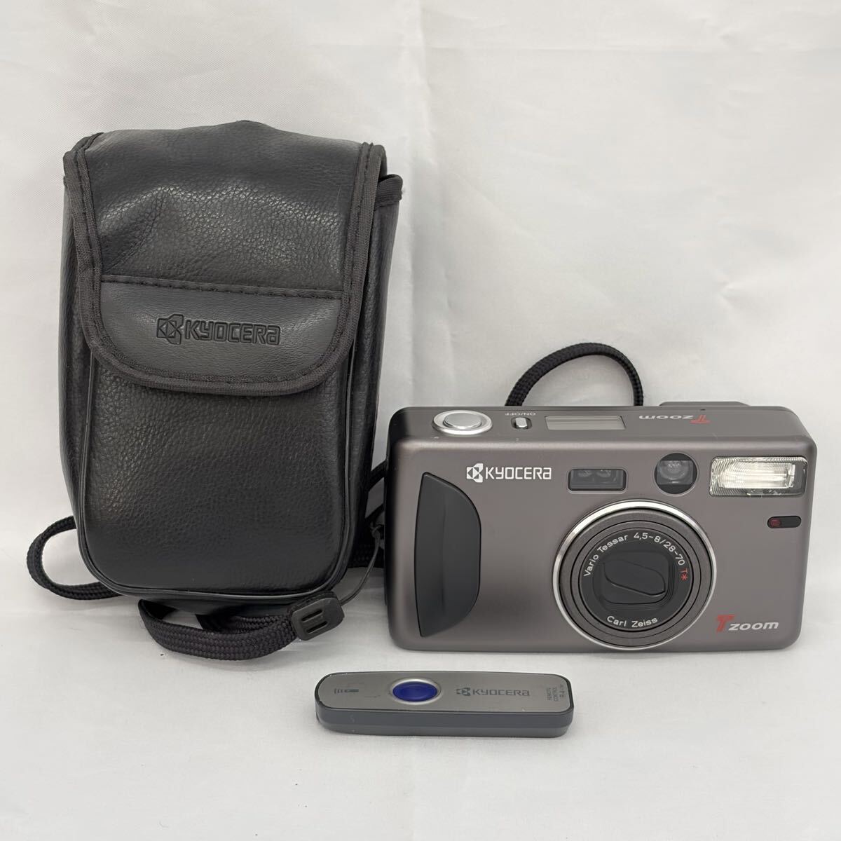 【1121M9】KYOCERA 京セラ T ZOOM Carl Zeiss Vario Tesser 28-70mm F4.5-8 コンパクトフィルムカメラ 高級コンパクトカメラ 通電確認済み_画像1