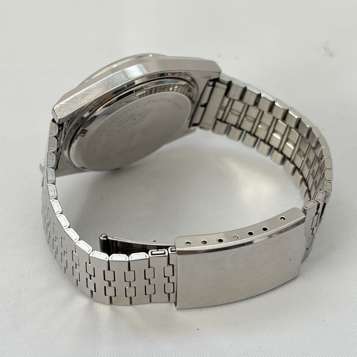 【1122M1】SEIKO セイコー TYPEⅡ 7546-7060 QZ クォーツ デイデイト シルバーカラー 3針 ラウンド メンズ腕時計 不動品_画像6