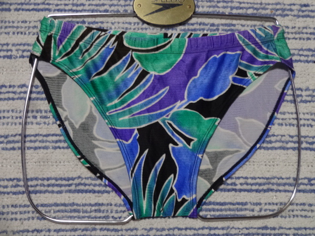 453　鋭いＶカットデザイン・スイムビキニパンツ　SizeＬ　グリーン×パープル×ブルー×ブラック×ホワイトの柄デザイン　中古_画像1
