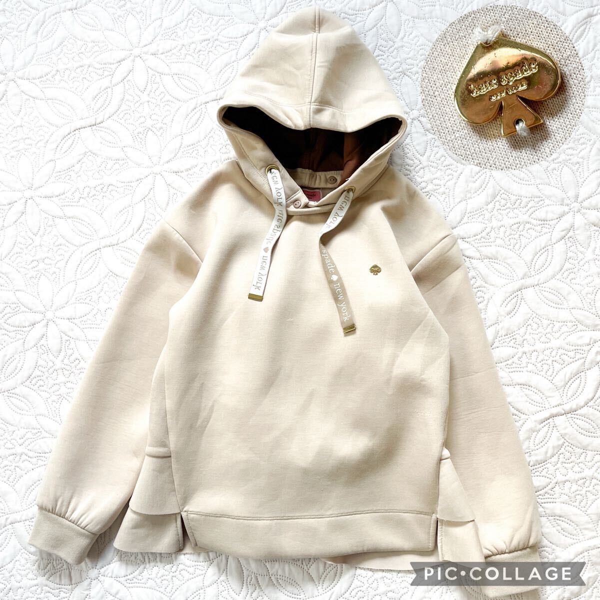 ケイトスペード　プルオーバー　150 ベージュ　フード　ペプラム　フリル　長袖　トップス　ロゴチャーム　_画像1