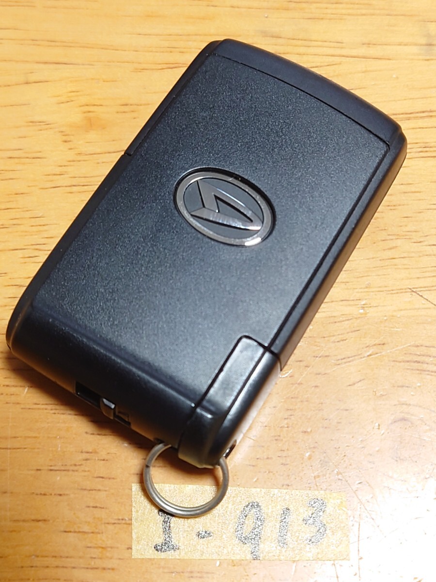 I-913【良品】ダイハツ 純正 スマートキー 2ボタン【刻印 007YUUL0498】ムーヴ/タント/ココア/コンテ/エグゼ 等 追跡あり/点灯OK/匿名配送_画像2