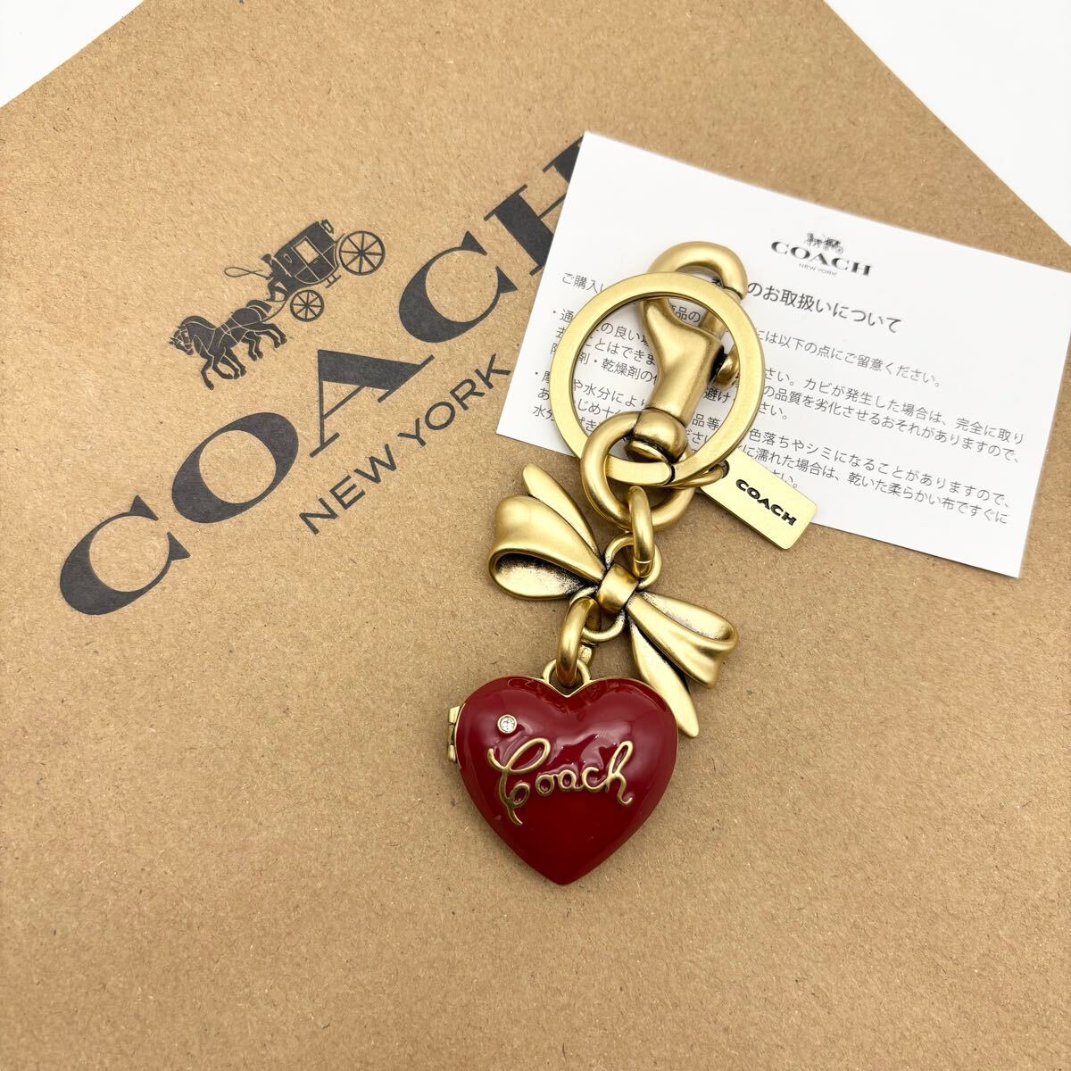 [COACH* новый товар ] bow Heart Rocket сумка очарование! латунь рубин!